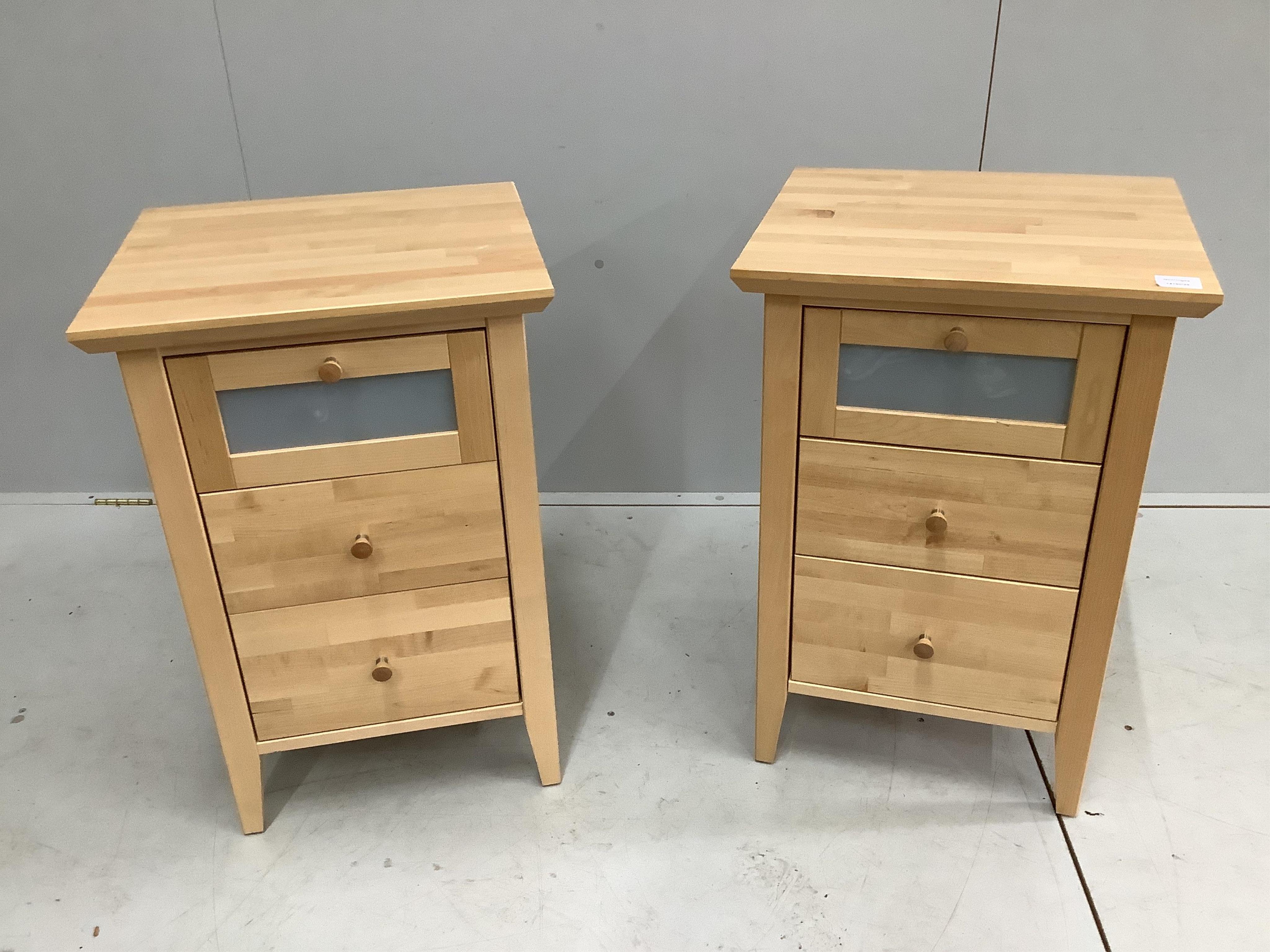 A pair of Contemporary beech bedside cabinets, width 47cm, depth 42cm, height 71cm. Condition - good